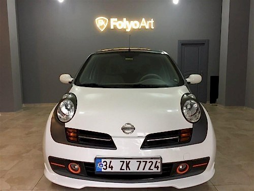 nissan micra araç kaplama cam filmi şerit kaplama turuncu gri siyah (1)