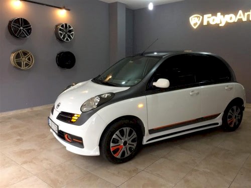 nissan micra araç kaplama cam filmi şerit kaplama turuncu gri siyah (11)
