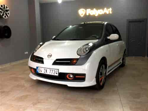 nissan micra araç kaplama cam filmi şerit kaplama turuncu gri siyah (7)
