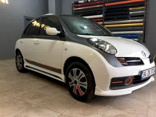nissan micra araç kaplama cam filmi şerit kaplama turuncu gri siyah (9)