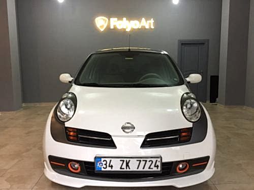 nissan micra araç kaplama cam filmi şerit kaplama turuncu gri siyah (1)