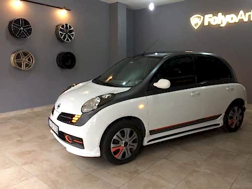 nissan micra araç kaplama cam filmi şerit kaplama turuncu gri siyah (11)