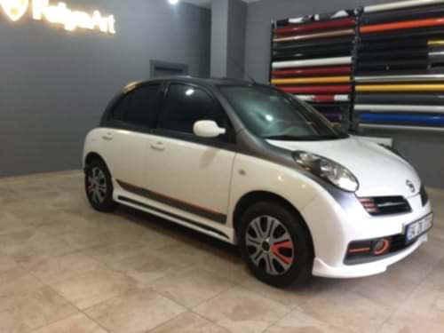 nissan micra araç kaplama cam filmi şerit kaplama turuncu gri siyah (2)