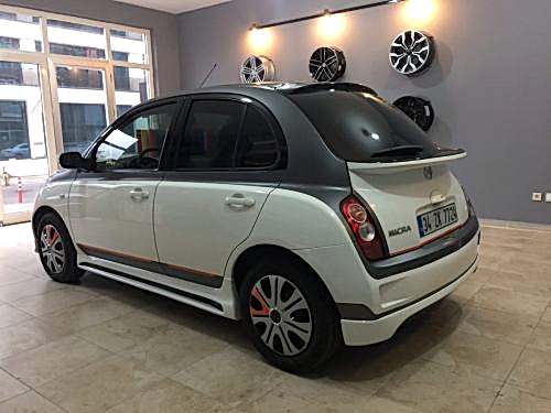 nissan micra araç kaplama cam filmi şerit kaplama turuncu gri siyah (4)