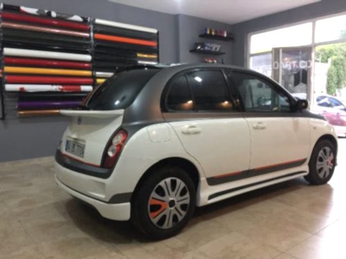 nissan micra araç kaplama cam filmi şerit kaplama turuncu gri siyah (6)