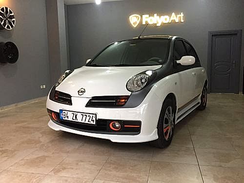 nissan micra araç kaplama cam filmi şerit kaplama turuncu gri siyah (7)