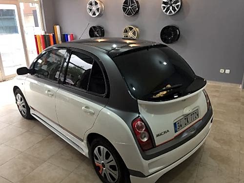 nissan micra tavan kaplama siyah cam tavan görünümü araç kaplama (4